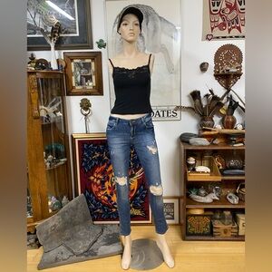 Women's Distressed Blue Jeans